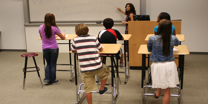 Standing desks in schools may cut obesity risk: study